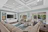 Huge living room with built ins and amazing natural light.