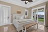 Downstairs bedroom with private entrance and wet bar