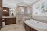 Separate shower and 2 vanity areas