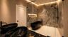 Gaudi Villas spa inspired primary bathroom
