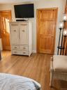 Primary Bedroom showing walk-in closet door and bathroom door