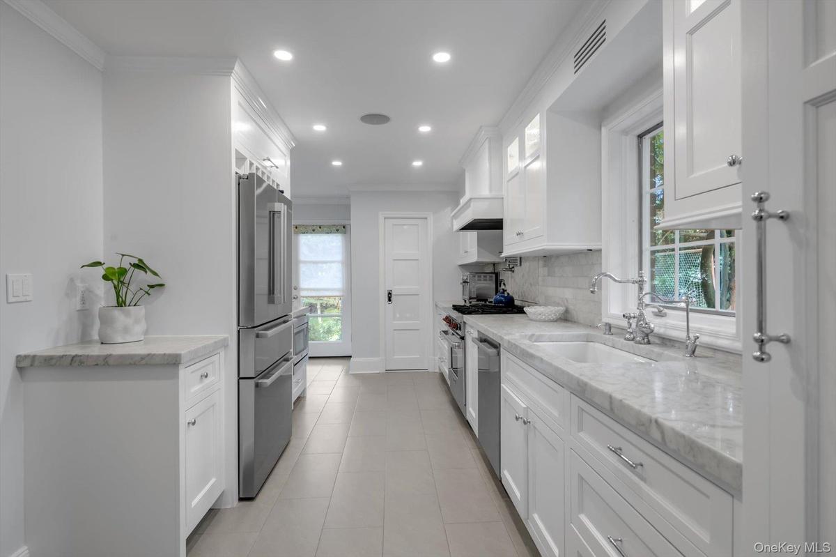 Updated kitchen with radiant heat.