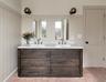 Two Sink Vanity with a Carrera Marble Top & Nickel Fixtures