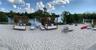 Private sandy beach featuring waterfront access and mature perimeter trees