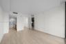 Master Bedroom with en suite bath Neutral interior space featuring wood-finish flooring, recessed ceiling lighting, and crisp white wall finishes