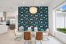 Dining area featuring a statement wall with botanical patterned wallpaper, a tiered shell pendant light, recessed ceiling lighting, large-format tile 