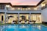 Rear exterior featuring a covered patio, rectangular swimming pool, second-story balcony with metal railing, and exposed ceiling beams