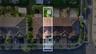 Aerial perspective of property lot featuring a tile roof, paved driveway, and private fenced backyard