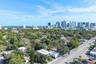 Aerial perspective featuring a dense canopy of mature trees and skyline exposure