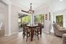 Breakfast nook overlooking pool and conservation