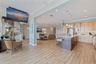 Kitchen/Living/Dining with spiral staircase to 3rd floor