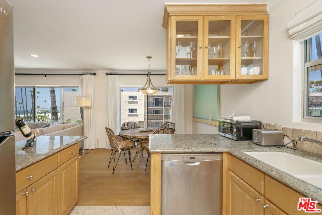 KITCHEN AND VIEW OF DINING ARE