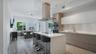 Open-concept living with Italian cabinetry, premium appliances, and contemporary finishes.