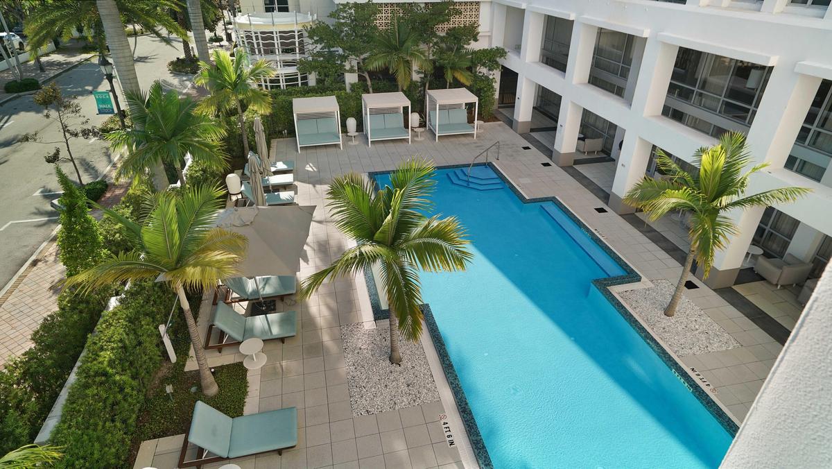 Resort-style pool and landscaped courtyard