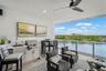 Expansive private terrace designed for outdoor living and entertaining, complete with a built-in gas grill.