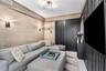 A versatile den offering an intimate setting for a home office, media room or guest retreat.