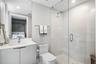 A well-appointed third bedroom with a private en-suite bathroom, providing comfort and privacy