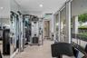 A private, state-of-the-art fitness center featuring premium equipment in an intimate setting.