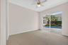Large Bedroom with walk in closet and sliders to courtyard pool