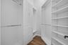 New Custom Closets in both Primary closets