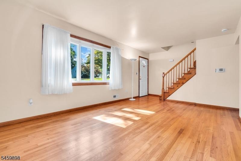 Front door into sunny LR