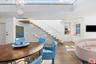 Dining with floating stairs