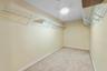 1 of 4 Large walk-in closets in the master bedroom provides substantial hanging and storage capacity.