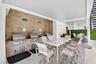 Covered grilling and dining area makes casual outdoor entertaining part of the Martinique 2 lifestyle.