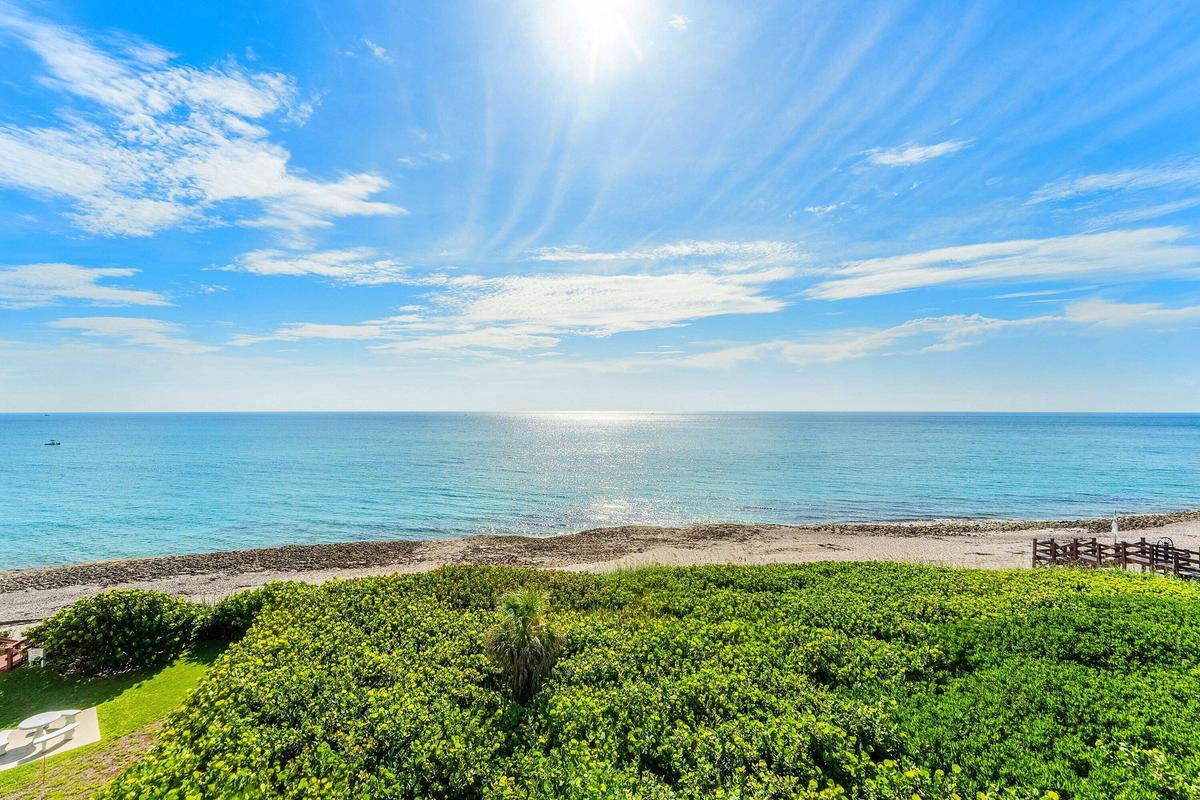 Direct Atlantic and beach views make Penthouse 401's dune-line oceanfront position unmistakable.