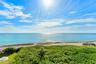 Direct Atlantic and beach views make Penthouse 401's dune-line oceanfront position unmistakable.