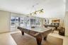 Billiards and social space provide additional indoor recreation for residents and their guests.