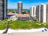 The Ocean House sits directly along the dune line creating a low-rise beachfront alternative to traditional tower living.