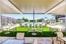 Outdoor seating is also available at The Q overlooking the expansive pool area