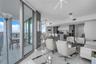Media and family room with terrace access and water views