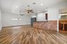 bonus room with 1/2 bath and wet bar.