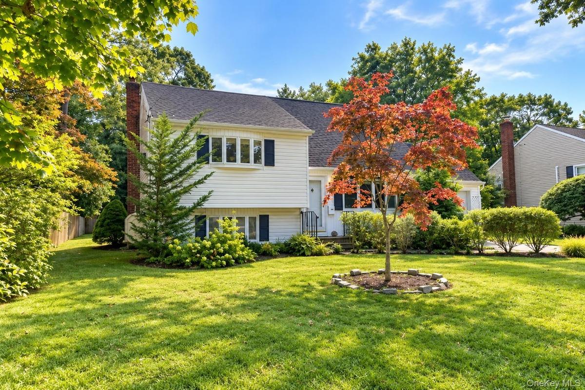 Beautifully landscaped yard .24 acres in Bellport VIllage!