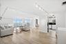 OCEANFRONT LIVING SPACE FRESHLY PAINTED WITH TILE FLOORING.