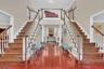 Inviting Double Stair Foyer