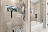 Bath 1 -Shower and tub with lighted niche.
