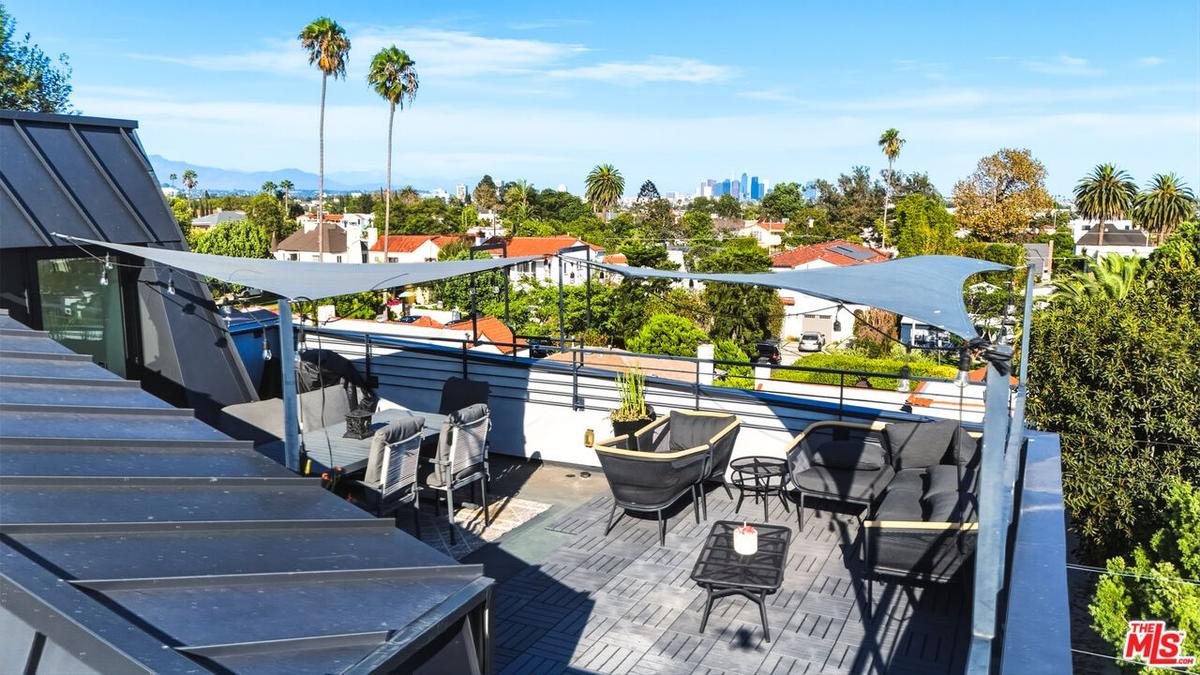 Private rooftop patio with swe