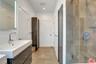 Spa-like primary bath with gla