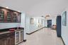 Condo Entrance into Huge Lobby (see built-in bar)