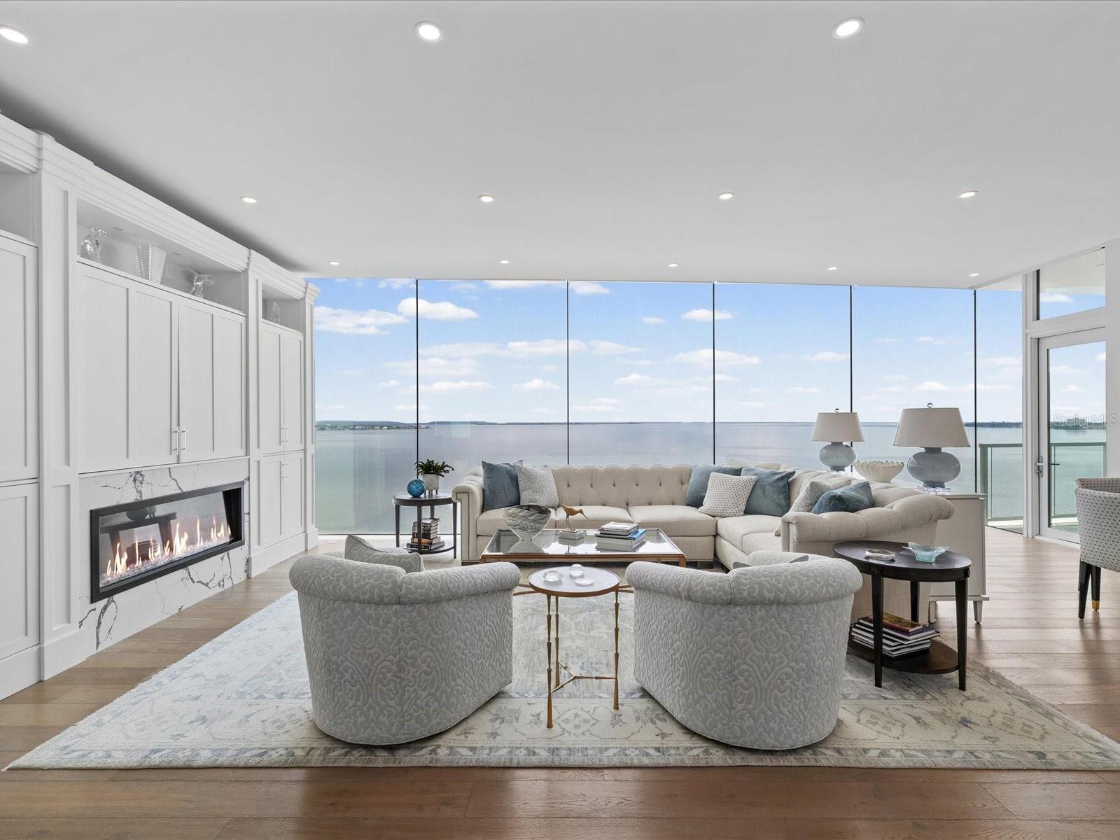 Floor to ceiling glass living room