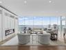 Floor to ceiling glass living room