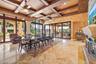 Floor to ceiling windows overlooking the pool