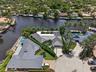 Aerial View of waterfront home with wide waterfront