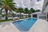 From pool and patio overlooking the water