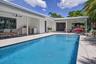 Spa style pool with fountain waterfall