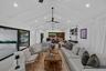 Stunning cathedral ceiling in living, dining areas and kitchen