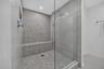 Large luxurious shower with seating
